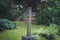 Gravestone on / cemetery - stone cross on grave