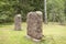 Gravestone at old semetery in Finland with grave crosses and stones