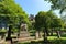 Gravestones at The Parish Church of St Cuthbert on sunny day