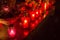 Graveyard candles at night.