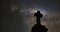 Graveyard tombstone with milky way galaxy night time lapse.