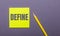 On a gray background, a bright yellow pencil and a yellow sticker with the word DEFINE
