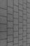 Gray background stone vertical canvas lines joints thin endless tiles hard surface