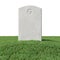 Gray blank gravestone on green grass isolated