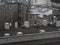 Gray and bleak roofs and courtyard facades of town houses