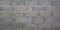 Gray brick cinder block wall background grey concrete tile cladding seamless texture