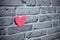 Gray brick wall with mini heart