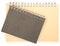 Gray and brown binder note book on white