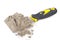 Gray cement powder with trowel