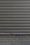 Gray city wall. Dark gray urban background. Copy space for text.Abstract background corrugated gray metal for wall pattern,