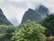 gray clouds over green karst mountains in Yangshuo