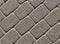 Gray color cobblestone pavement surface.