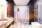 Gray and concrete bathroom interior, a shower blur