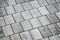 Gray concrete tiling pavement, background texture