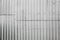 Gray corrugated metal fence texture