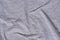 Gray creased cotton jersey background texture