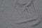 Gray creased jersey knit fabric background texture