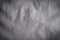 Gray creased material background or texture