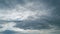 Gray cumulus rain dark clouds panoramic view. Massive dark rain storm clouds bg for weather forecast. Timelapse.