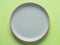 Gray dish mockup on green background