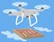 Gray drone quadcopter fly in blue sky.