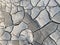 Gray dry cracked beautiful texture of arid soil soil and desert clay. The background