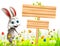Gray Easter bunny with big wooden sign