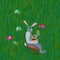 Gray easter rabbit with egg on chair on lawn