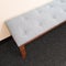 Gray elegant bench on carpet floor