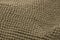 Gray fabric texture of a piece of woolen carpet