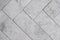 Gray floor tiles, herringbone pattern