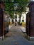 Gray Friars church yard, a London park, with empty seats and clear, central lanterns and graves full