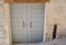 Gray front door in Urbino - Italy