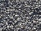 Gray gravel background - small stones. Stone aggregate.