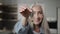 Gray-haired female buyer homeowner broker caucasian woman old granny seller holds bunch keys of rental apartment flat
