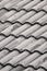 gray house roof gray ceramic roof wavy background vertical