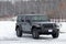 Gray Jeep Wrangler Rubicon Parked in Snowy Lot