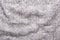 Gray knitting wool texture background Crocheted fabric texture Top view Copy space