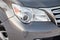 Gray Lexus GX460 2010 release front headlight view on the car snow parking after preparing for sale