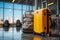 Gray luggage with a touch of yellow makes a statement at the airport