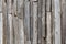 Gray messy wooden planks wall suface texture and background