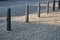 Gray metal bollards are used to protect pedestrians in the pedestrian zone or in the park on the promenade. gray pillars prevent p