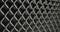 Gray metal grid on black background