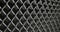 Gray metal mesh with dark square mesh rhombuses