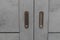 Gray modern Entrance door Exterior. Closed sliding Door with metal handles