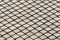 Gray monolithic wall cement smooth lattice metal horizontal diamond endless repetition base geometric background