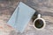 Gray note book with coffee cup