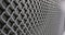 Gray perforated metal mesh industrial background