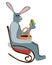 Gray rabbit sitting on rocking chair and holding easter egg