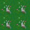 Gray rabbits on rocking chair front grass lawn with easter eggs